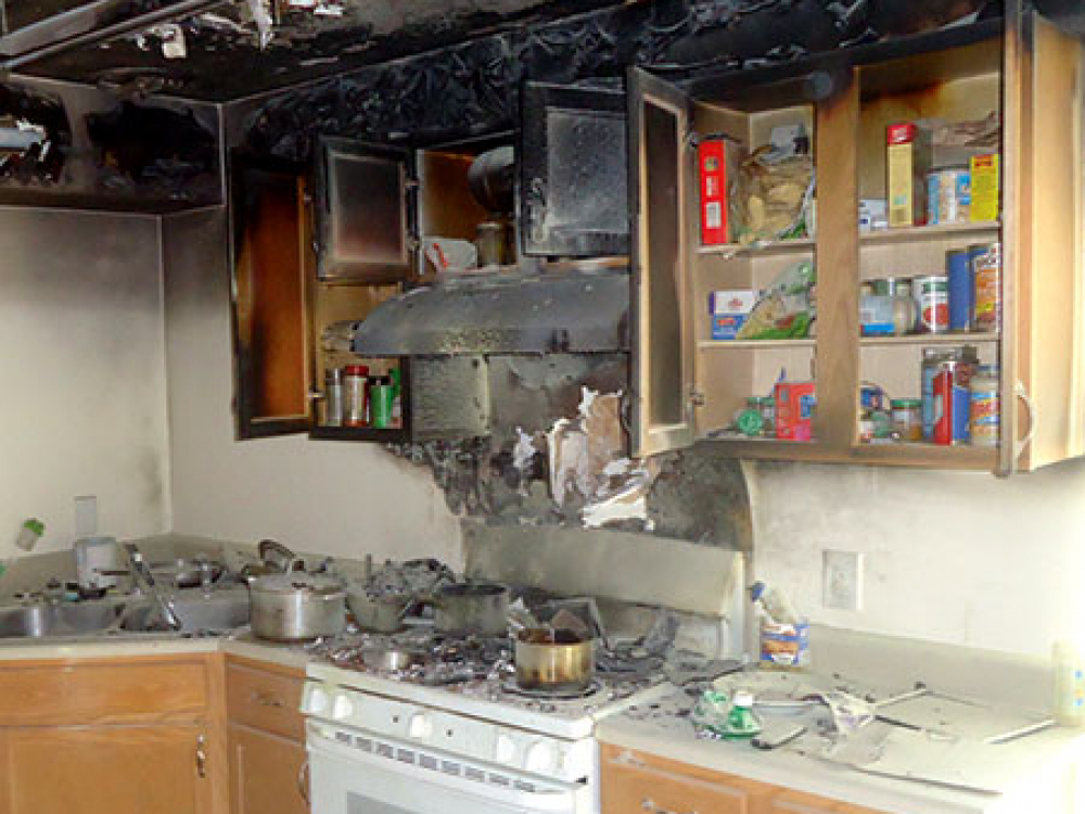 A damaged kitchen needing fire damage restoration services from ServiceMaster